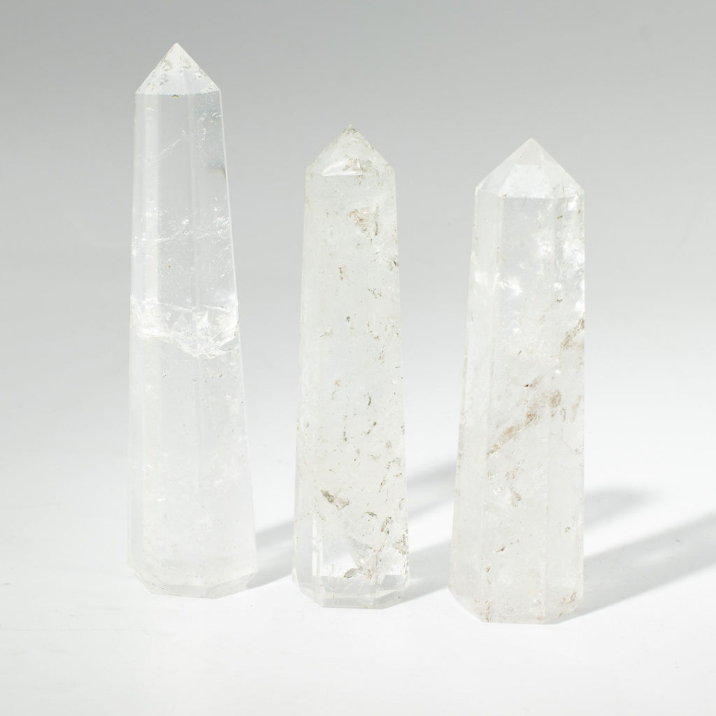 Obelisk Point – Clear Quartz · 11 cm – styled view