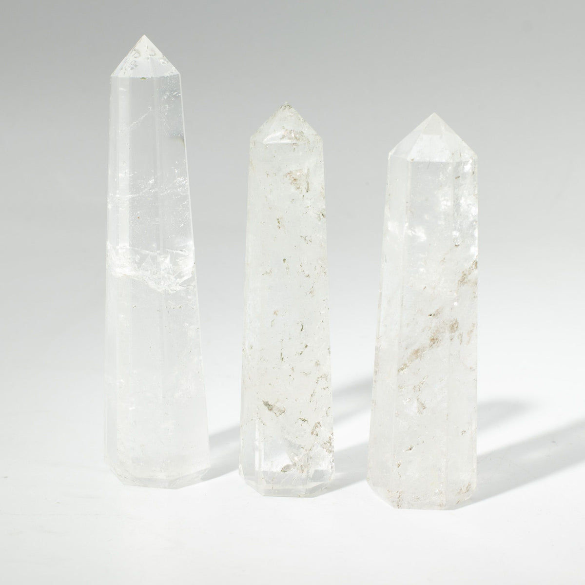 Obelisk Point – Clear Quartz · 11 cm – styled view