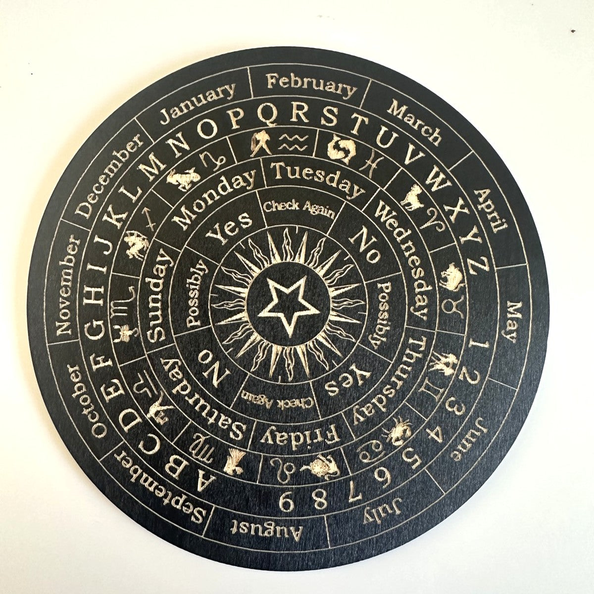 Black pendulum board with sun, moon and alphabet