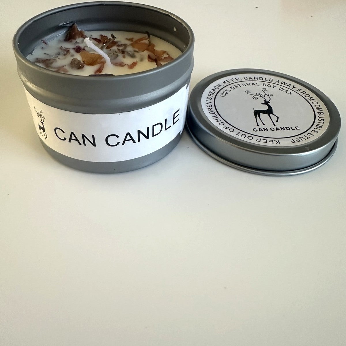Soy candle in tin with dried petals