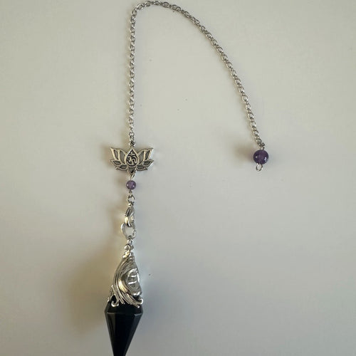 Black stone pendulum with lotus charm